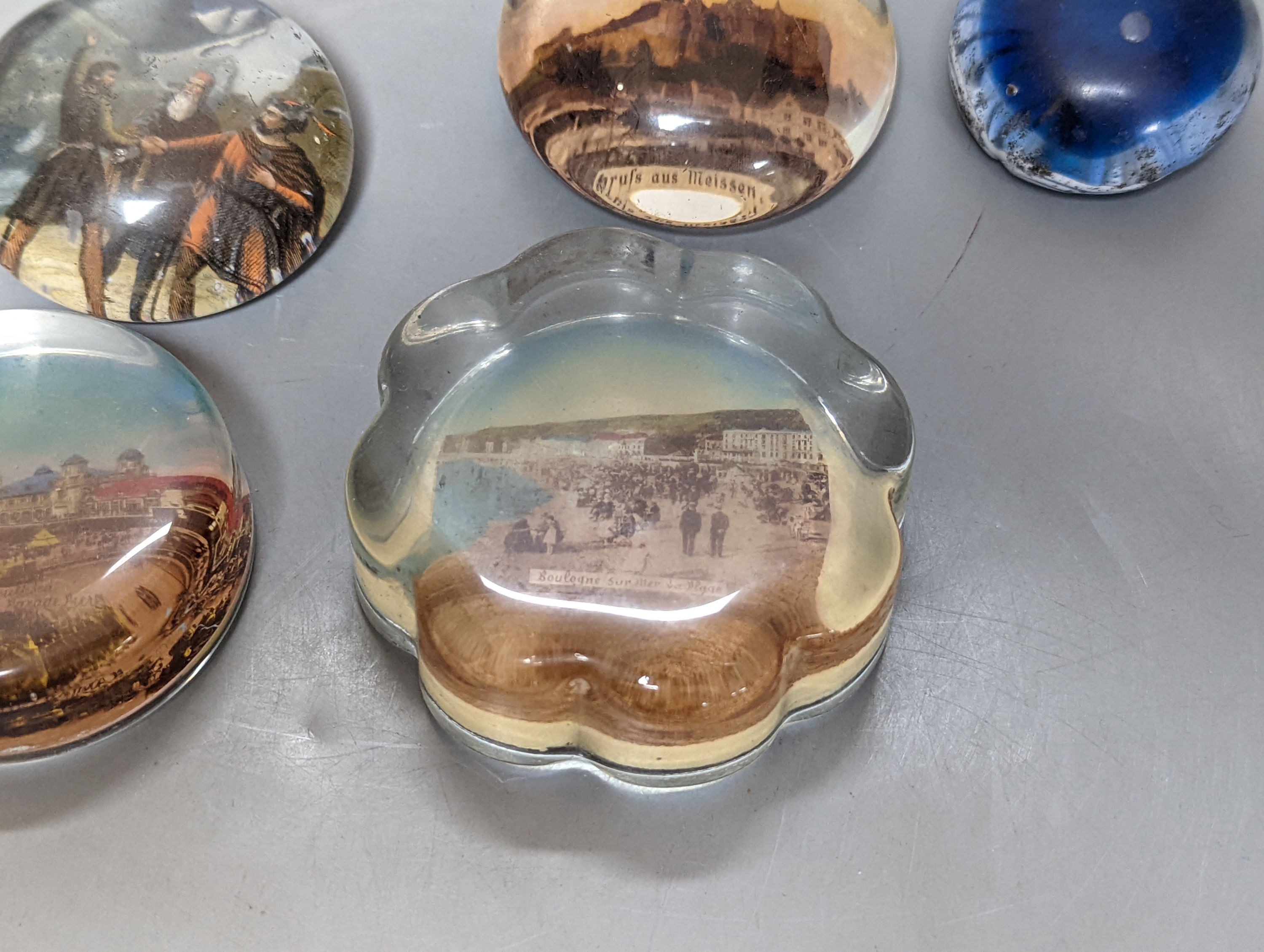 Nine various glass paperweights
